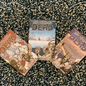 Volumes 1-3 of the walking dead comic books